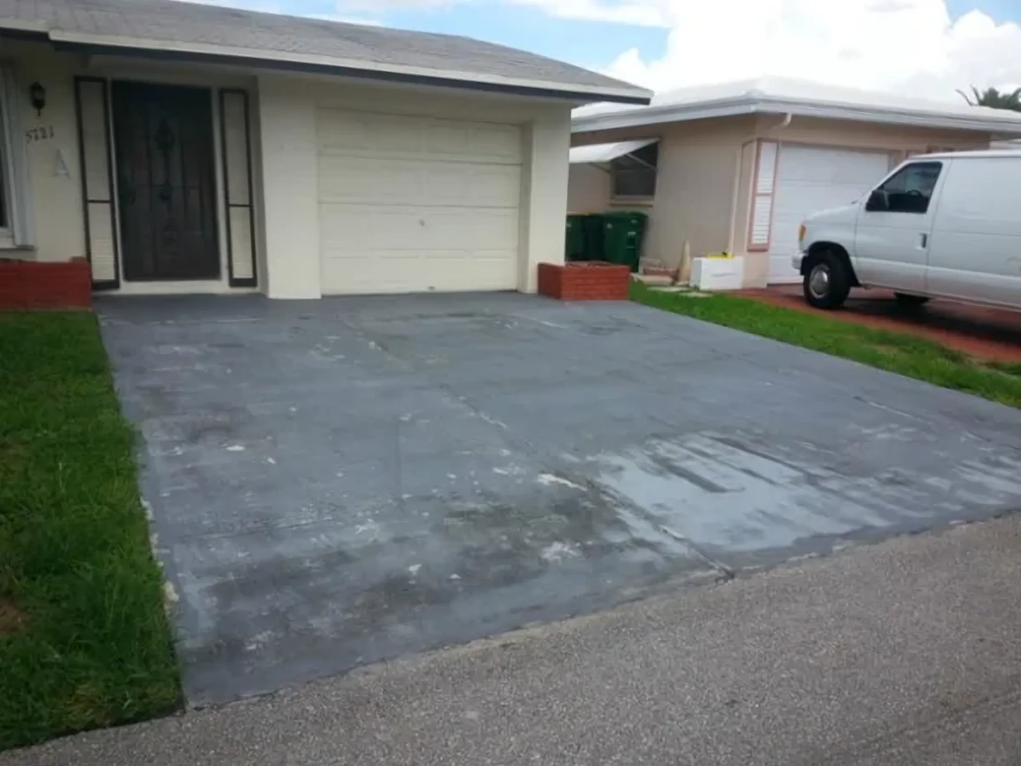 Stained driveway before sealing